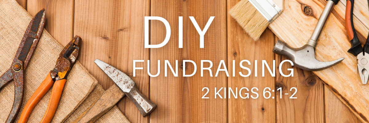 A variety of hand tools including a hammer, pliers, paintbrush, and screwdriver are arranged on a wooden surface. The text 'DIY Fundraising' is centered in bold white letters, with a scripture reference below.