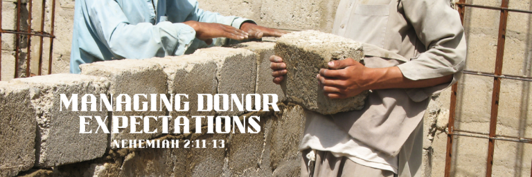 Two workers building a stone wall, each holding large concrete blocks, with the title Managing Donor Expectations overlaid on the image.