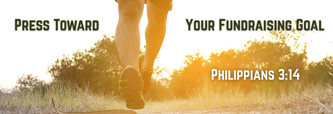 Close-up of a runner's legs and feet mid-stride on a dirt path at sunset, backlit with warm golden light and greenery along the trail. Text overlay reads "Press Toward Your Fundraising Goal — Philippians 3:14."